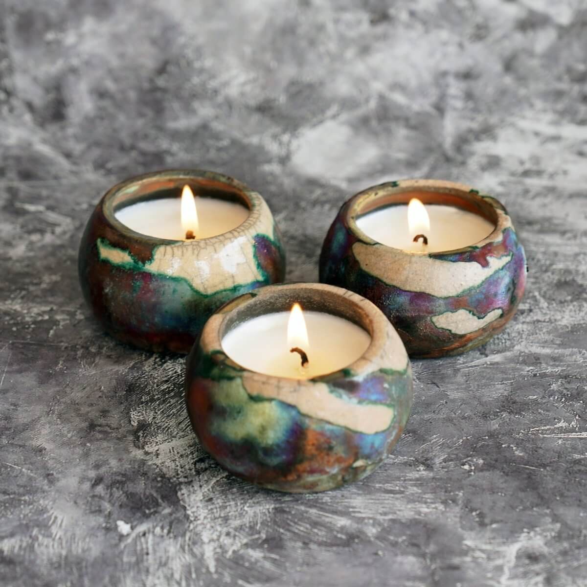 https://www.raaquu.com/cdn/shop/products/akari-raku-refillable-set-of-3-medium-scented-soy-wax-candles-raaquu-basics-handmade-pottery-home-decor-444306.jpg?v=1700668926&width=1445